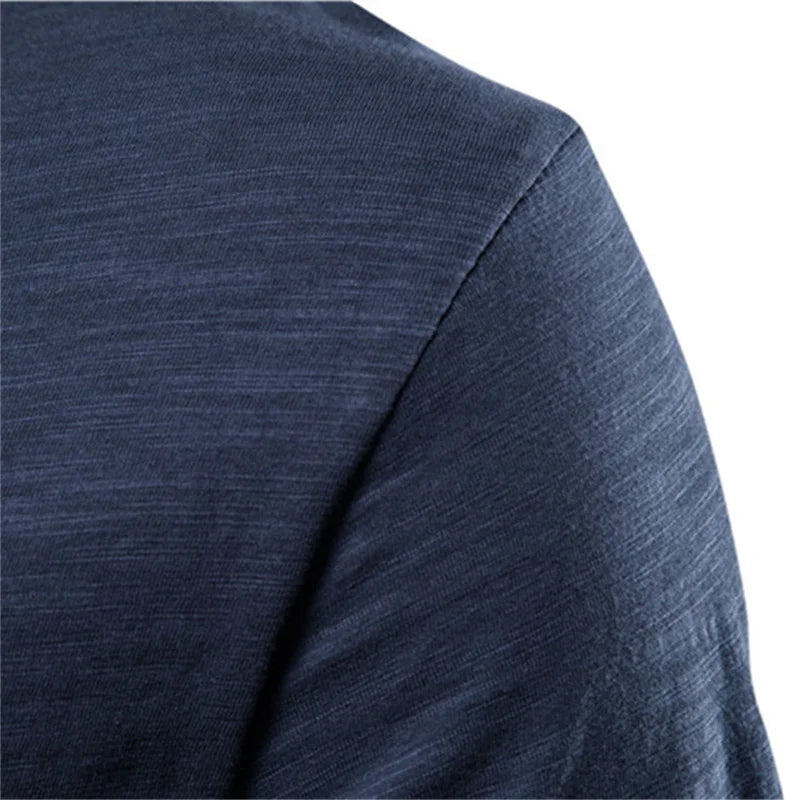 Close-up of navy blue 100% cotton men’s T-shirt fabric with a soft hand-feel.